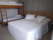 Cama em quarto pacote 7 dias Réveillon Balneário Camboriú com café incluso