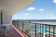 New Listing! Updated direct oceanfront condo with a pool, hot tub, and garage parking