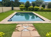 Stylish Riverside Home with Pool, Braai & Wi-Fi