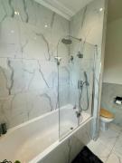 Airy hillside flat with views Airy hillside flat with views