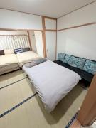 Large two separated rooms with 5 beds in the Osaka