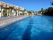 Apartamento com jardim em condomínio resort