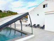 Evans Realty CI Piscina climatizada BBQ Juegos