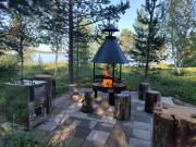 Hillavilla in the shore of lake Inari