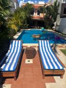 Magnifica Villa Palmeras luxurious 4 Br 6 Bds 4 Ba private pool lagoon front super fast Wifi