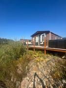 Luxury mini lodge with lakeside views