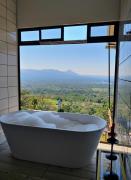 Hygge House with a view of the Arenal Volcano and the San Carlos Plain