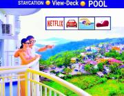 Tagaytay Hideaway 1-Bedroom Sleeps 4 in CITYLAND Prime Condo with Living room, Kitchen, Balcony, free Swimming Pool, 1 Parking, Wi-Fi, Netflix, Perfect View-Deck on 24F Rooftop