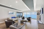 Sophisticated Three-Bedroom Coastal Apartment with Fireplace