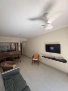 Apartamento Praia do Tombo - Aconchego, wifi, garagem e ar-condicionado