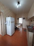 Praia pe na áreia com garagem e suite