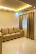 Condo 2BR Oasis beside SM Mall Free Pool Fast Wifi 4-5pax