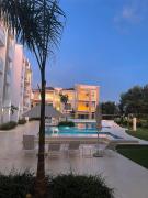 Cozy Poolfront Apartment located inside the HARD ROCK CAFE