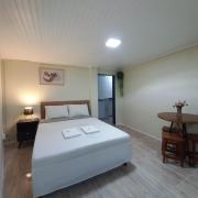 Suíte Aconchegante em Hospedaria no Centro