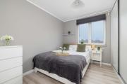 Modern 2-Bedroom Apartment with Remote Workspace in Katowice by Noclegi Renters