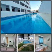 Skyview Apartment- Poolside Stay Near the Beach