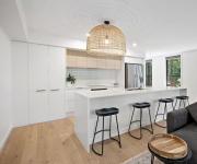 Stylish Sun Soaked Duplex Walk to Beach