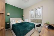 Green Apartment in Warsaw with Parking, Bathtub and Desk for Remote Work by Noclegi Renters Green Apartment in Warsaw with Parking, Bathtub and Desk for Remote Work by Noclegi Renters