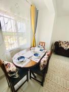 Cosy 2bdrm mombasa CBD pool gym washer AC