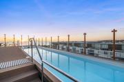 Coastal Apartment with Rooftop Pool
