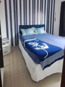 Apartamento com piscina e wifi, 8 minutos da praia!