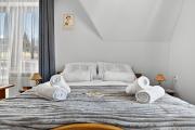 Gut Apartment - 2 sypialnie, duża kuchnia, kino domowe NETFLIX & HBO, kryty parking, szybkie WIFI, 5km od Zakopane