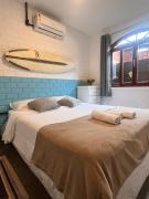 Quarto Backdoor, confortável e a 50m da praia do Campeche