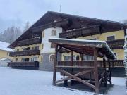 Family skiing under Chopok