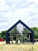 Summer House Surrounded By Reeds Near Limfjorden