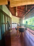 Flat Iansã Condomínio beira-mar Varanda Piscina.