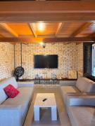 Casa aconchegante a poucos passos da praia