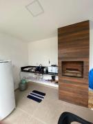 Suíte privativa aconchego a alguns passos da praia