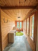 Authentic Wooden House by the River with an Igloo