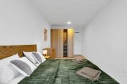 Central apartment with free garage parking