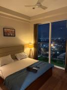 a irbnb in greater Noida Omaxe trade center alpha 2