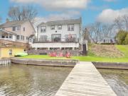 Cast away with kayaks a game room a fire pit and views