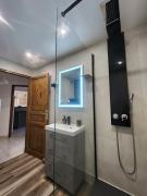 Appartement rez-de-jardin avec terrasse privative