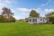 Langs de Kleine Haven, Sfeervol Chalet op 5 Sterren Vakantiepark De Kuilart