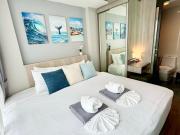 Stylish 1BR Surin Beach Kitchen & Rooftop Pool by Renttini