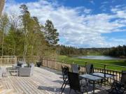 Fresh cottage with lake view and rowing boat SE09156