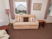 Top Newton by the Sea