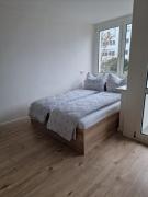 40 m2 Appartement Nürnberg Ost mit Balkon 8 Min by car to Expo Modern Stay Highspeed WLAN Quiet and Green