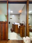 Suíte de hóspedes imersa na natureza