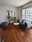 Bright 2BR with Balcony & Green Views