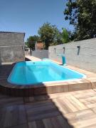 Casa com piscina na praia de torres