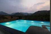 Vaikunth Villa 3-BHK Getaway with Rooftop Pool, Sit-out Area, Jacuzzi, Scenic Lake & Hill Views