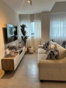 REFA - 404 · Luxury 1BR Suite in Piantini | Modern • Pool • Gym