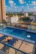 Flat com piscina na cobertura em Intermares