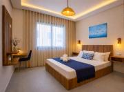 Boho Beige Apartment - Walkable to Beach with Workspace, Fast WiFi, AC & Full Kitchen