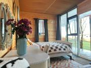 Valley view cabin in the woods on a farm